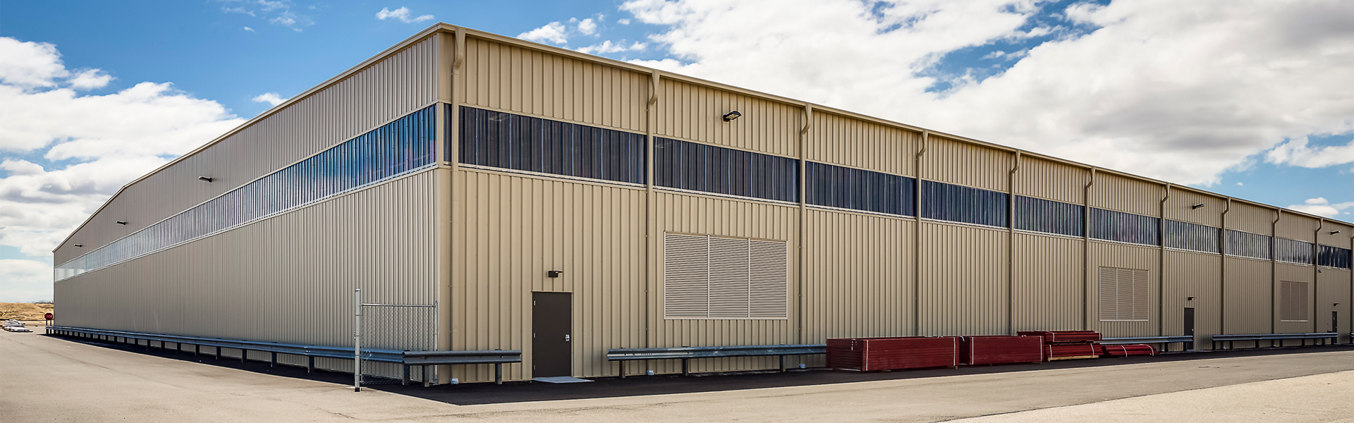 Riverhead Building Supply metal building exterior with long roofline and clerestory windows
